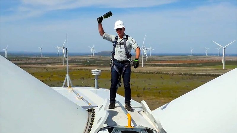 Jeff Bezos on a wind turbine